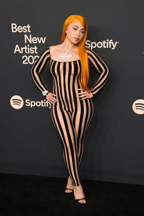 ice spice naked tits|Ice Spices striped catsuit gives naked dressing meets Beetlejuice